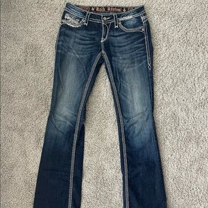 Sequin rock revival boot cut jeans